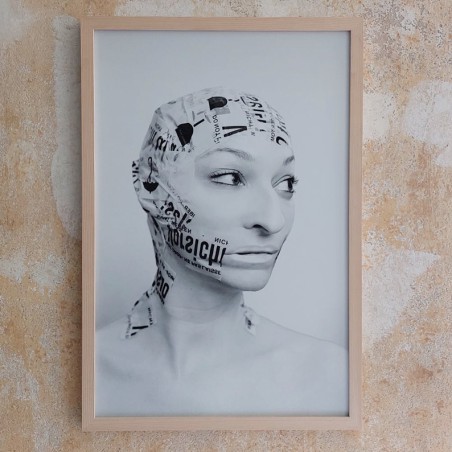 Print from the series Caged (Original german title: Befangen). Tapelifted face without wig in black an white.